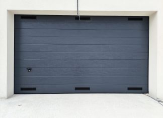 Instalación de puerta seccional residencial Novoferm Puerta Seccional Novoferm